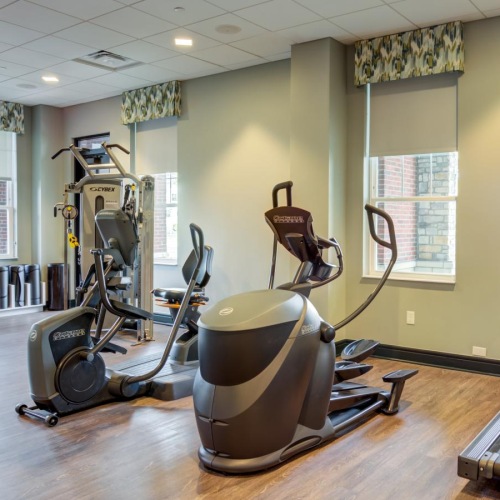 Get your workout on a room with exercise equipment