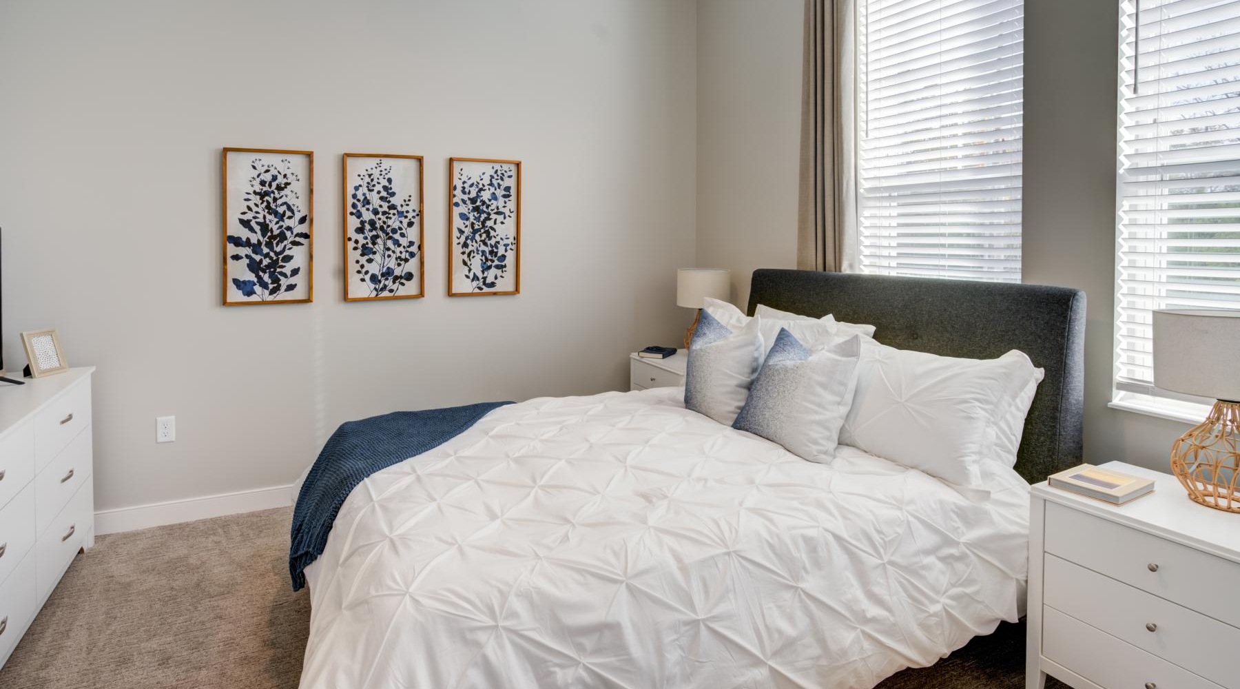 a bed with white sheets